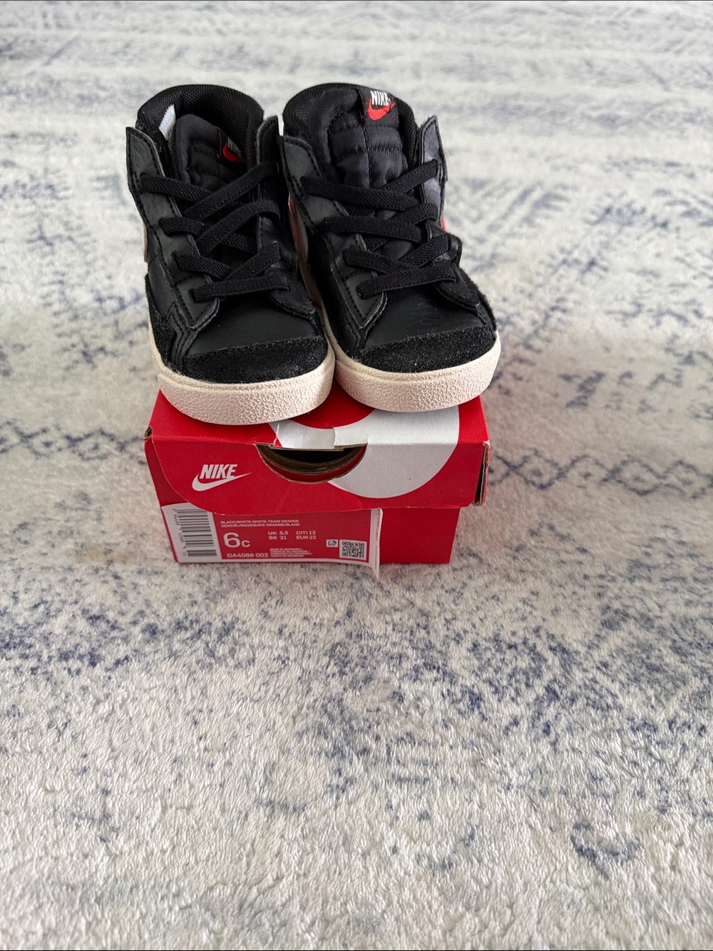 Nike Kids Black High-Top Sneakers with Red Logo